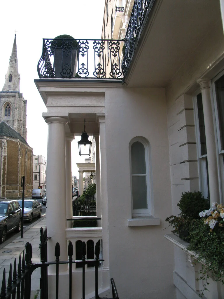 Georgian doorway with columns on a town street