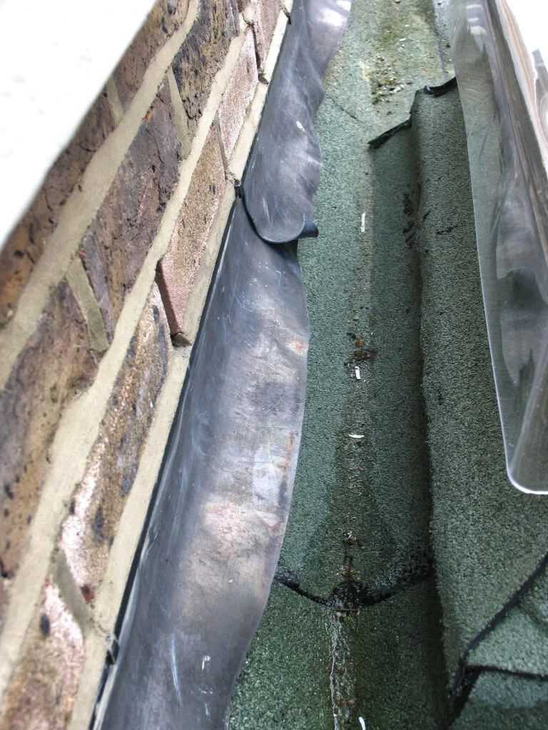 Close view of a failing roof covering